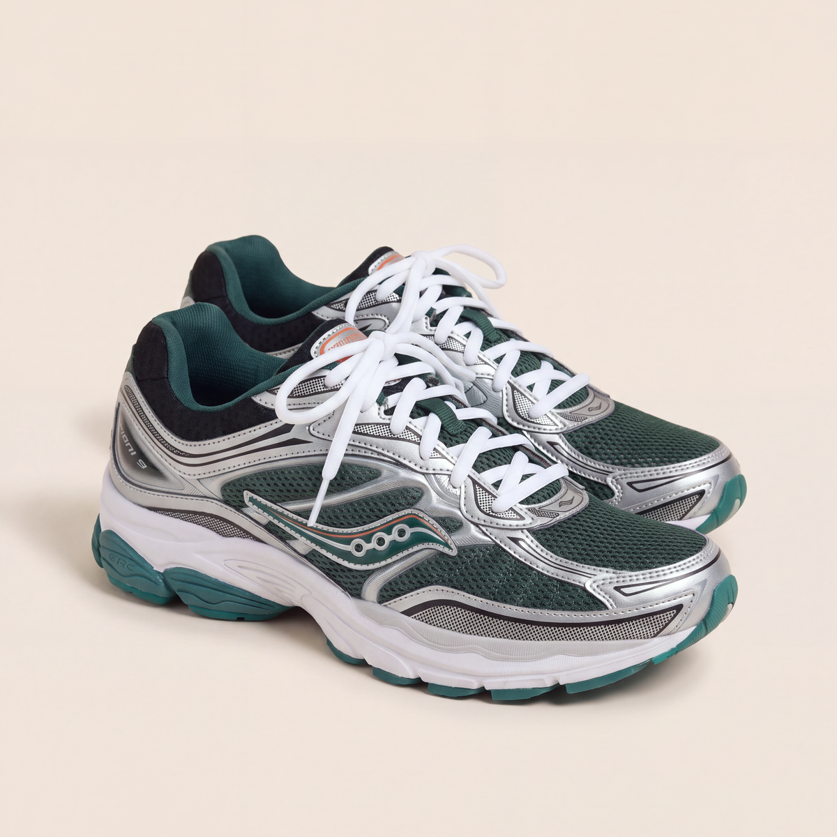 Saucony ProGrid Omni 9 in Green / Silver / Teal