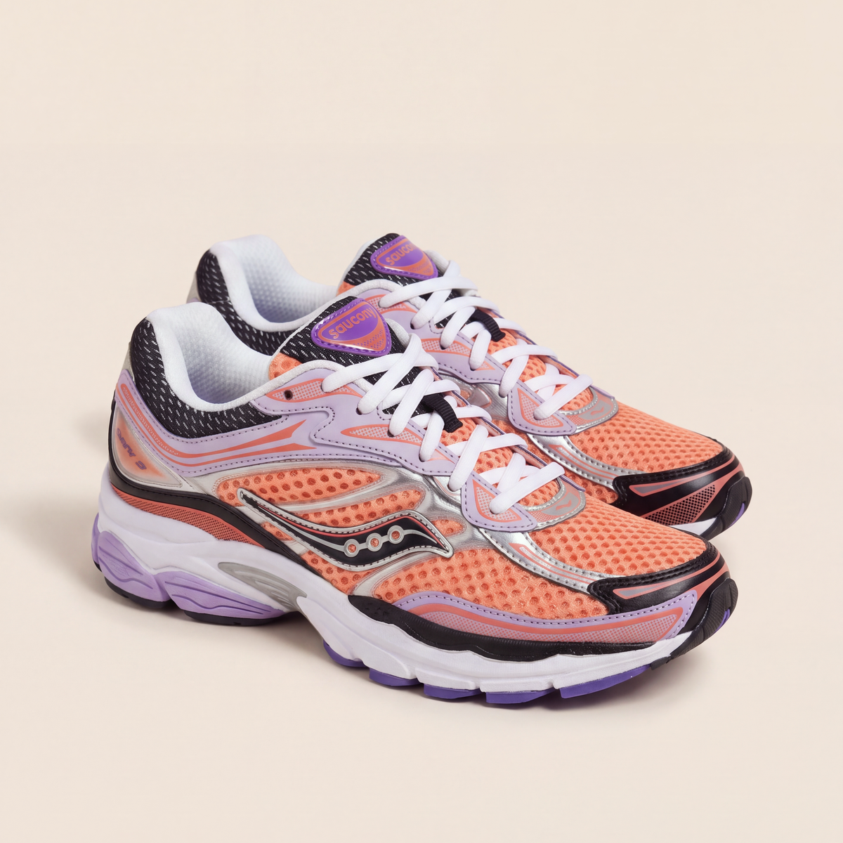 Saucony ProGrid Omni 9 in Orange / Lilac / Silver